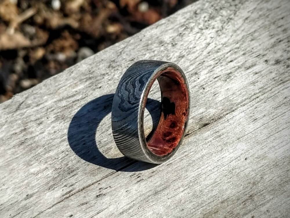Damascus Steel ring with Pellin Burl liner