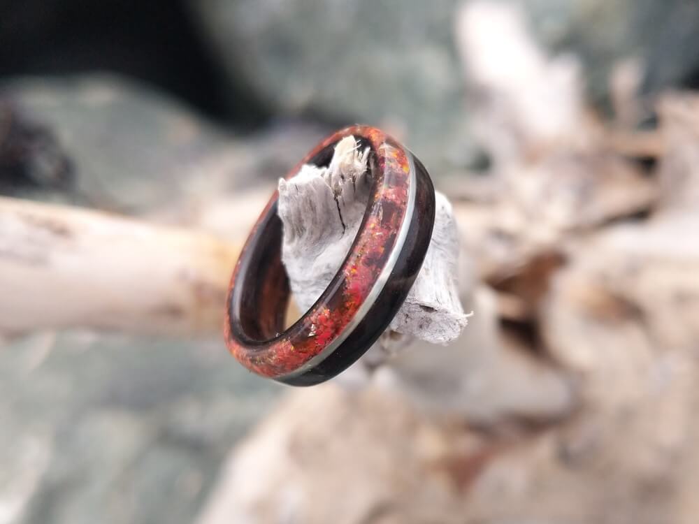 Macassar Ebony wood ring with Red Obsidian and Red Opal edge and Sterling Silver inlay