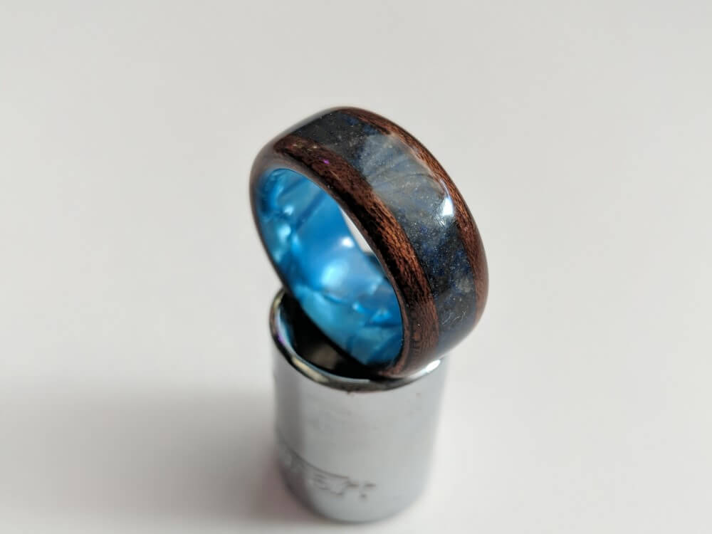 Hawaiian Koa wood ring with Electric Blue Celluloid liner and Lapis Lazuli inlay